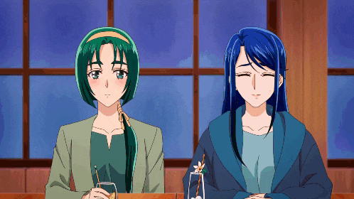 two anime girls are sitting at a table with drinks in their hands