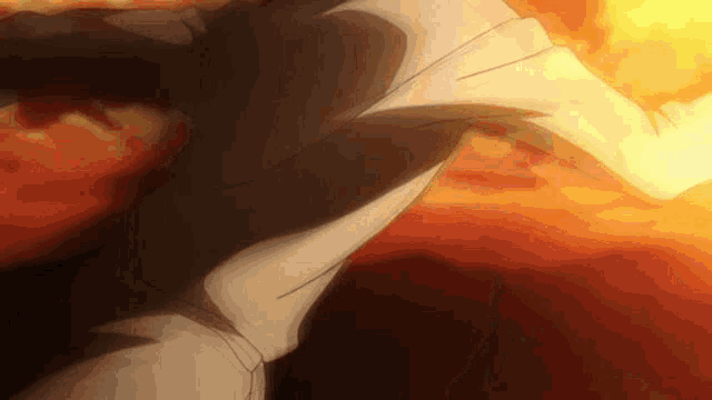 a close up of a person 's arm in front of a fire background