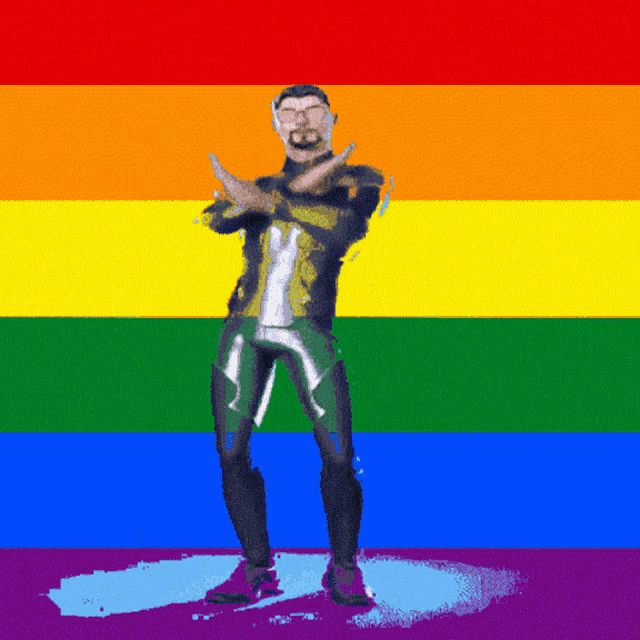 a man in a superhero costume stands in front of a rainbow flag