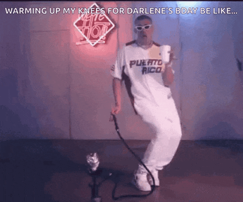 a man is standing in front of a hookah in a room .