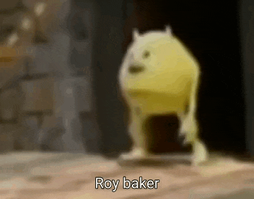 a cartoon character from monsters inc is standing on a wooden floor and says roy baker .