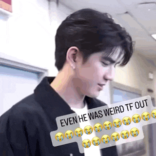 a man is standing in a hallway with a sticker that says even he was weird tf out