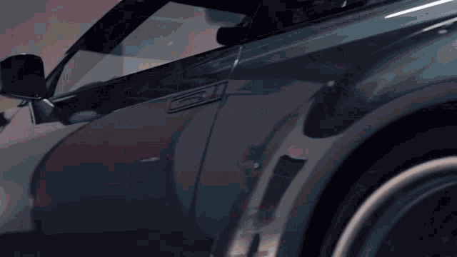 a close up of the side of a car with the letters gt on the side