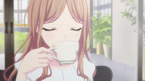 a girl is drinking a cup of coffee with her eyes closed and her mouth open