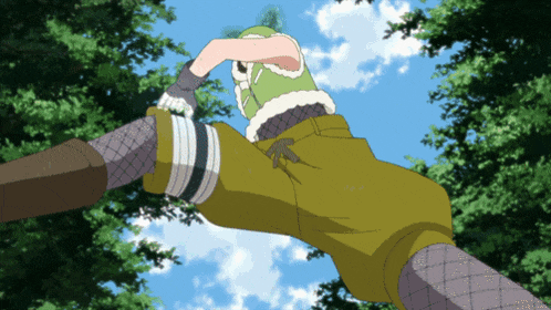 a person wearing a green hat is kicking another person in the leg