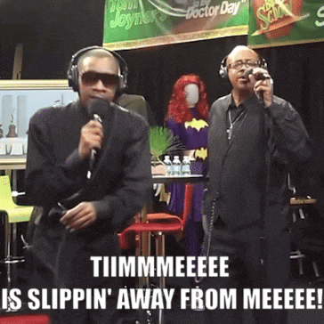 two men singing in front of a sign that says doctor day on it