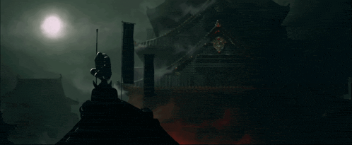 a silhouette of a man holding a sword in front of a building