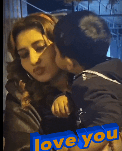 a little boy kissing a woman on the cheek with the words " love you " below him