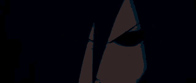 a close up of a person 's face with red eyes and black hair