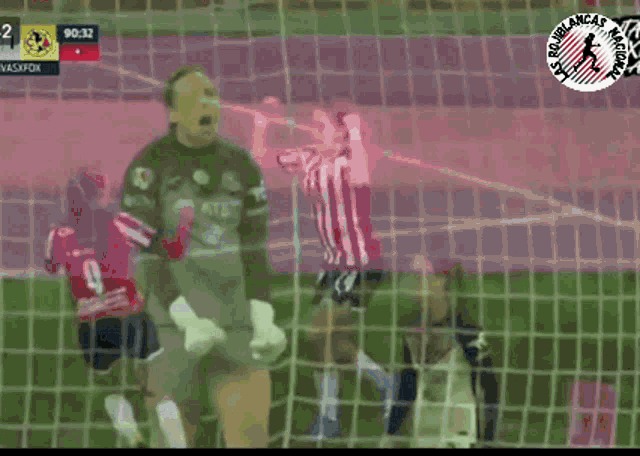 a soccer game is being played with a score of 2 to 2