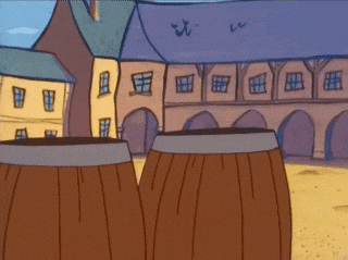 two barrels are lined up in front of a building with arches
