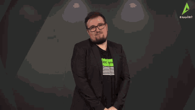 a man in a suit is wearing a shirt that says choc lmn on it