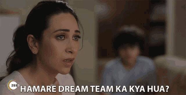 a woman says " hamare dream team ka kya hua " in front of a boy