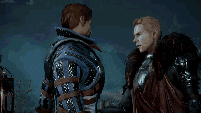 two men in armor standing next to each other
