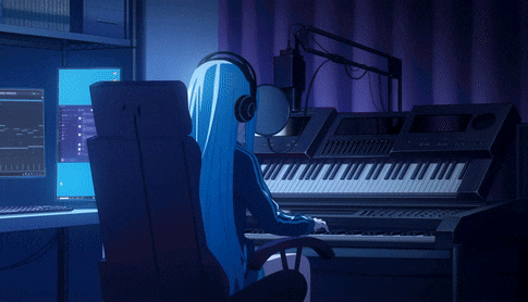 a blue haired anime girl wearing headphones looks at a monitor