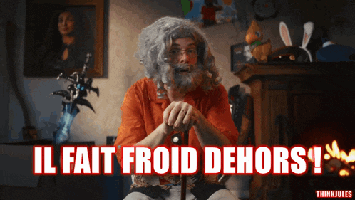 a man with a beard and a cane says il fait froid dehors in red letters