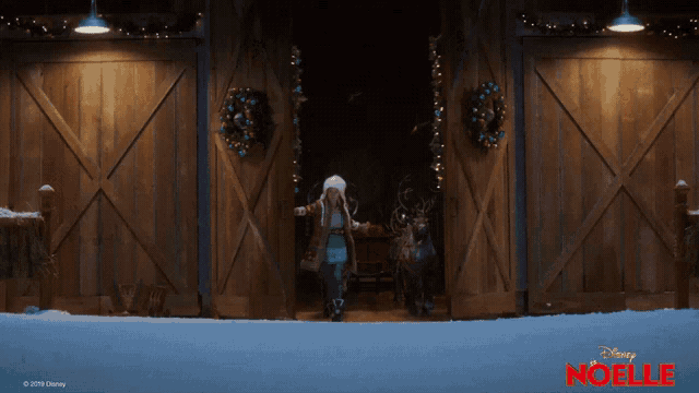 a poster for disney 's noelle shows a girl standing in front of a barn