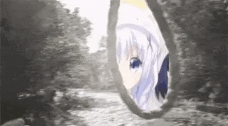 a black and white photo of a girl looking through a hole in a rope .