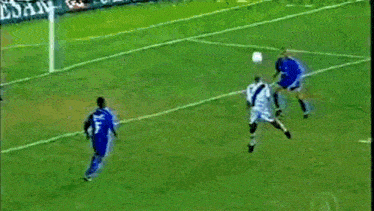 a soccer game is being played on a field with a banner that says old cesar
