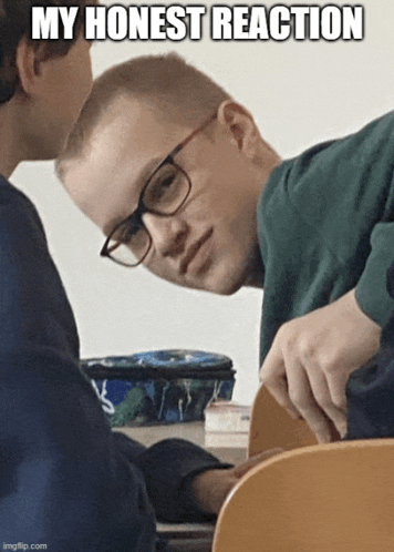 a man with glasses looks over his shoulder at another man with a caption that says my honest reaction