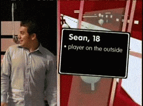 a man with a sign that says sean 18 player on the outside