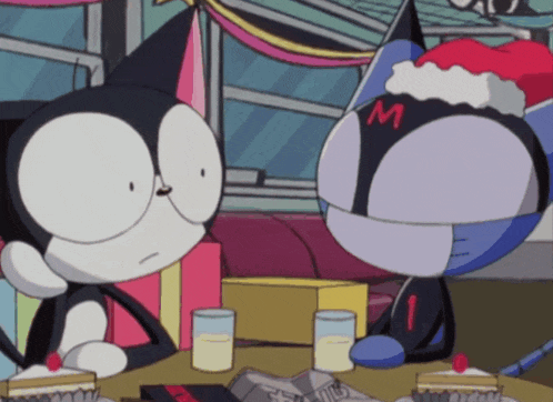 two cartoon cats are sitting at a table and one has the letter m on his back