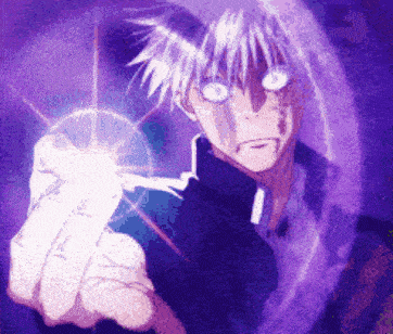 a person is holding a purple object in their hand and pointing at it .
