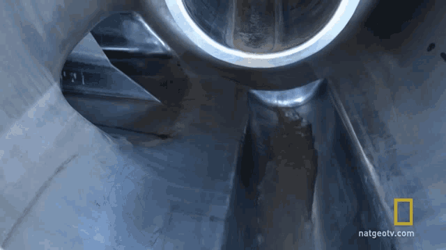 a close up of a metal object that says nat geotv.com