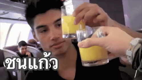 จิบน้ำส้ม ชนแก้ว GIF - Cheers Sip Orange Juice GIFs