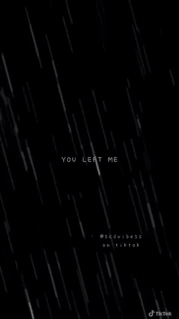 a black background with white rain drops and the words `` you left me '' .