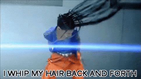 a person is whipping their hair back and forth