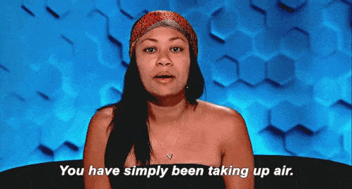 a woman without a shirt is talking about taking up air .