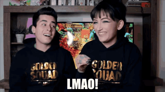 a man and a woman wearing hoodies that say golden squad lmao