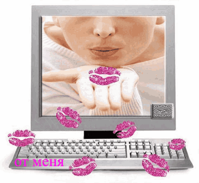 a computer screen shows a woman blowing a kiss with pink lips