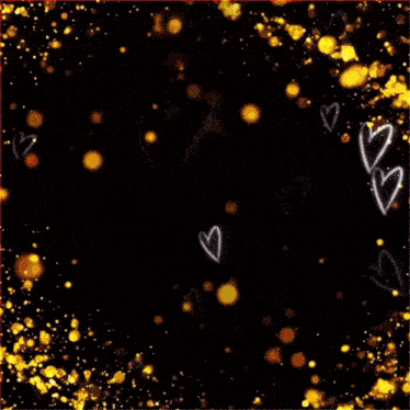 a black background with hearts and gold sparkles on it