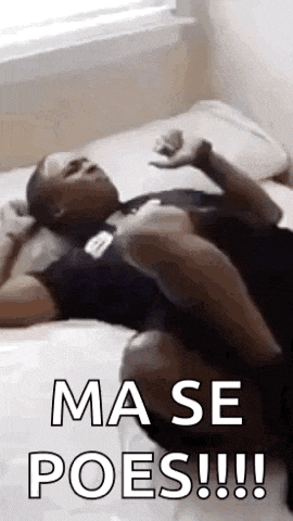 a man is laying on a bed with his legs crossed and the words `` ma se poes !!! '' written above him .
