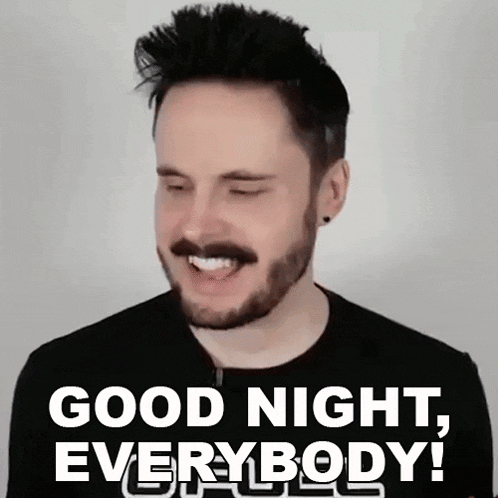 a man with a beard and mustache is smiling and saying `` good night , everybody '' .