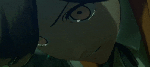 a close up of a person 's face with tears coming down their face