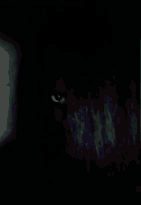 a person 's eye is shown in the dark