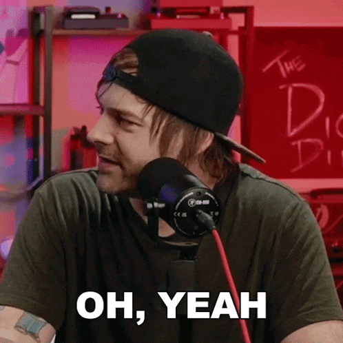 a man wearing a black hat and a black shirt says oh yeah