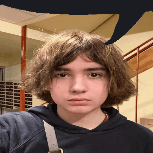 a young boy with a speech bubble above his head that says ' i 'm sorry '