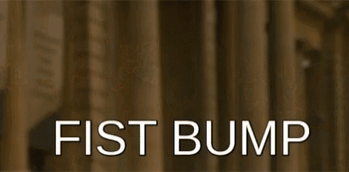 a fist bump is being thrown at a man