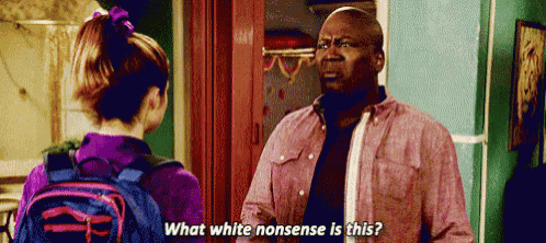 a man in a pink shirt is talking to a girl in a purple shirt who is asking him what white nonsense is this .
