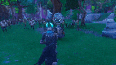 a video game character with horns is fighting a group of zombies .