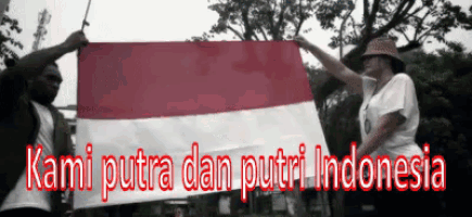two people holding a red white and blue flag with the words kami putra dan putri indonesia