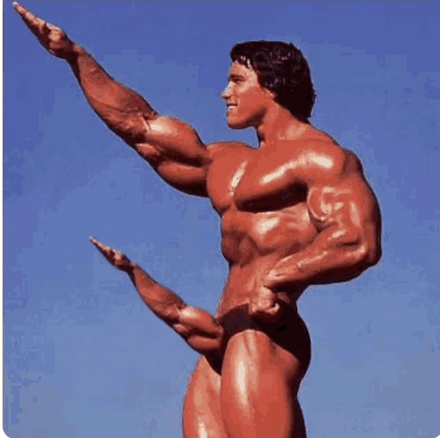 a statue of arnold schwarzenegger with his arms outstretched and his penis visible