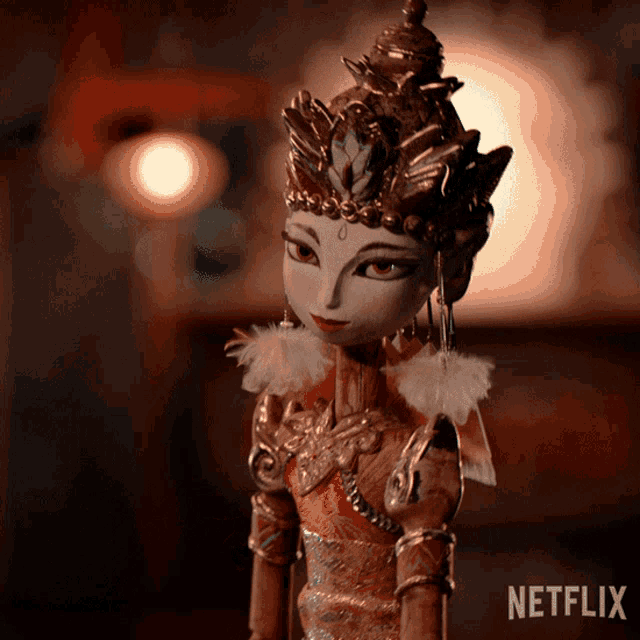 a close up of a doll with a netflix logo on the bottom