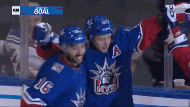 a group of hockey players including number 93