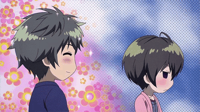 a boy and a girl are standing next to each other
