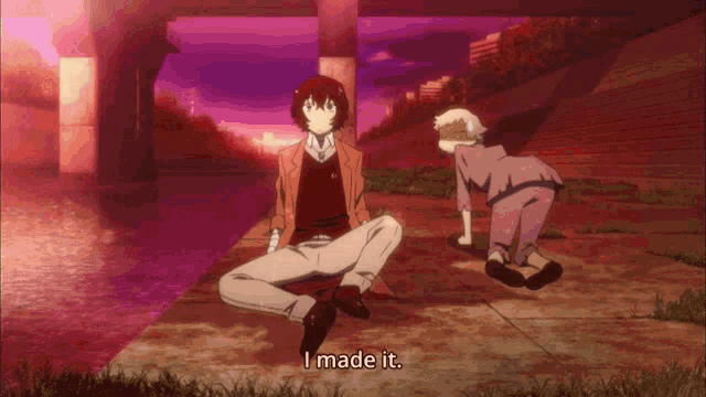 a man sits on the ground with the words i made it next to him